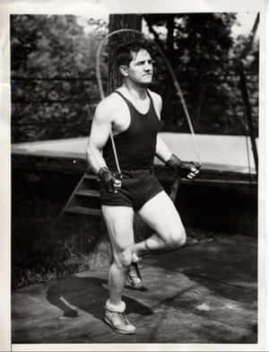 Pete Latzo Doing A Jumping-rope Workout Wallpaper