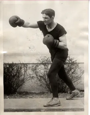 Pete Latzo Throws A Punch In The Air Wallpaper