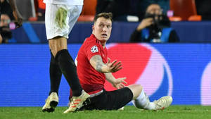 Phil Jones On The Ground Wallpaper