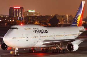 Philippine Airlines Airplane In City Airport Wallpaper