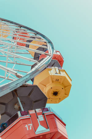 Photograph Of Pastel Vintage Ferris Wheel Wallpaper