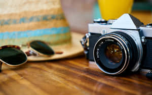Photography Camera With Sunglasses And Hat Wallpaper