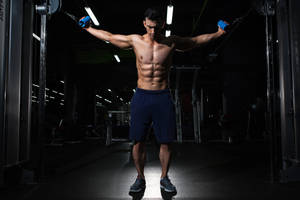 Physically Fit Man Weightlifting Wallpaper