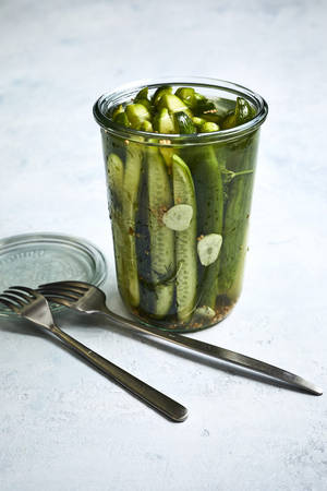 Pickles In A Glass Cup Wallpaper