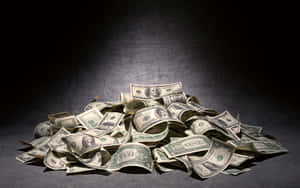 Pile Of Money On A Dark Background Wallpaper