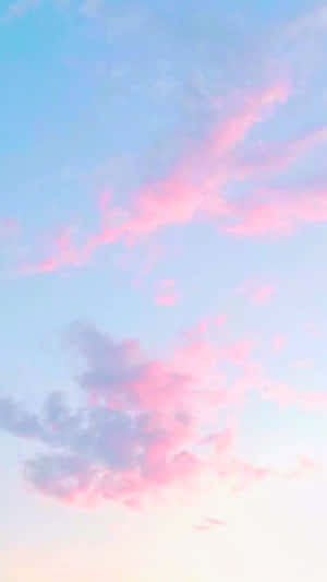 Pink And Blue Clouds In The Sky Wallpaper