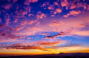 Pink And Blue Sunset Clouds Wallpaper