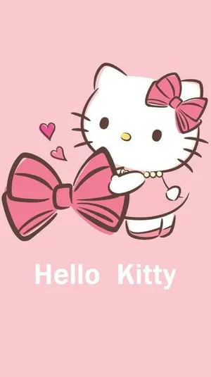 Pink Hello Kitty Holding A Bow Wallpaper