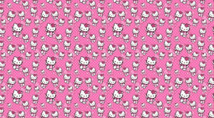 Pink Hello Kitty Walking Loaded Graphic Wallpaper