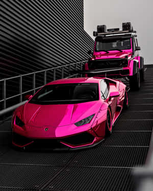 Pink Lamborghiniand S U V Urban Showcase Wallpaper