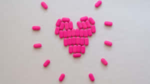 Pink Pills Heart Shape Wallpaper