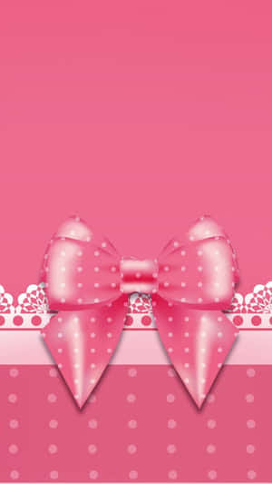 Pink Ribbon Symbol On A Blurred Background Wallpaper