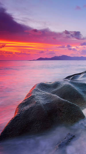 Pink Sunset Over The Ocean. Wallpaper