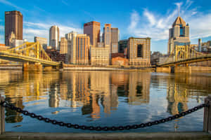 Pittsburgh Skyline Between Bridges Wallpaper