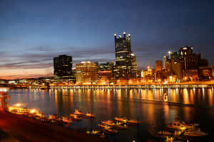 Pittsburgh Skyline With Boats Wallpaper