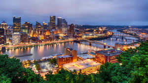 Pittsburgh Skyline With Several Bridges Wallpaper