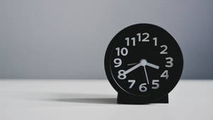 Plain Black Analog Alarm Clock Wallpaper