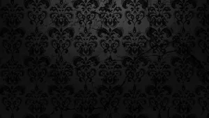 Plain Black With Ornate Floral Pattern Wallpaper