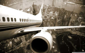 Plane Desktop In City Wallpaper