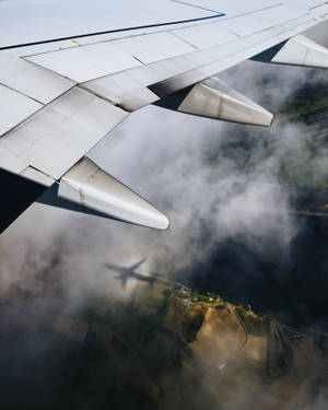 Plane Shadow On Cloud Wallpaper