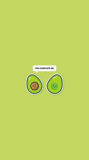 Playful Banter Between Two Adorable Avocados Wallpaper