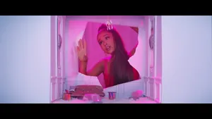 Pop Star Ariana Grande Showcasing Her Iconic 7 Rings Wallpaper