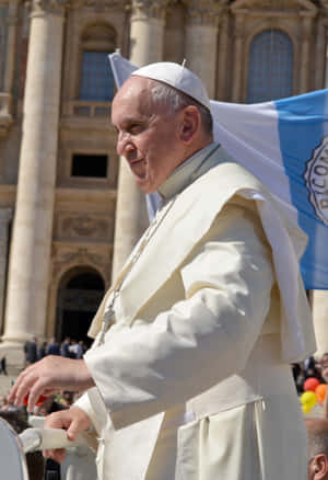 Pope Francis Delivering A Sermon With A Compassionate Expression Wallpaper