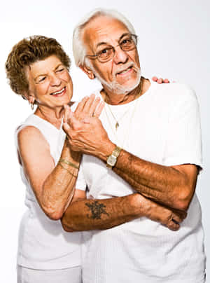 Portrait Of A Happy Mature Couple In White Wallpaper