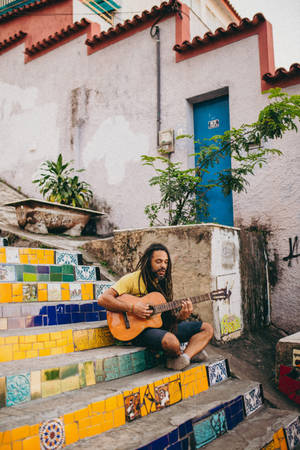 Portrait Of A Long-haired Mexican Man Wallpaper