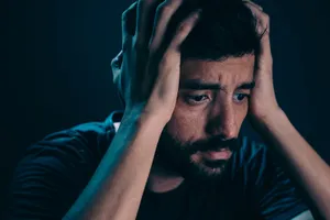 Portrayal Of Man Exhibiting Anxiety Wallpaper