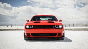 Power Unleashed - The Dodge Challenger: A True Embodiment Of Muscle And Style. Wallpaper