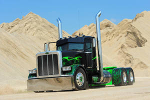 Powerful Peterbilt Trucks Ready To Transport Goods Wallpaper