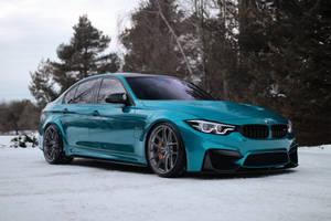 Powerful Turquoise M3 Bmw On Laptop Screen Wallpaper