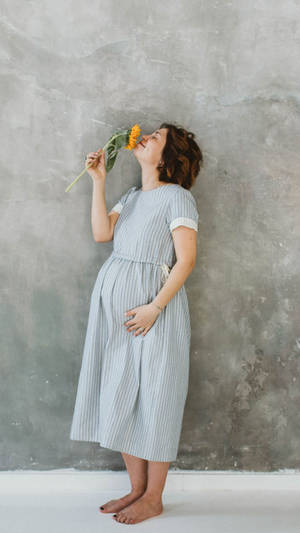 Pregnancy Smelling Flower Wallpaper