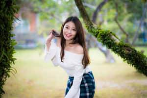 Pretty Asian In Park Wallpaper