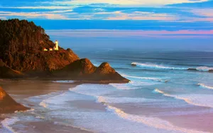 Pretty Ocean With Lonesome Lighthouse Wallpaper