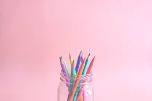 Pretty Pastel Colored Pencils In Jar Wallpaper