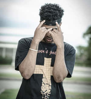 Prettyboyfredo Playing Video Games And Showcasing His Skills Wallpaper