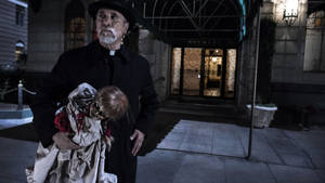 Priest And Annabelle Doll Wallpaper