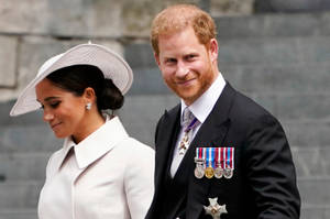 Prince Harry Charmingly Smiling At The Cameras Wallpaper