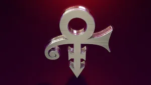 Prince Symbol In Fancy Gold Finish Wallpaper