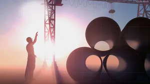 Professional Engineer At Work On A Construction Site Wallpaper