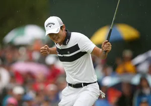 Professional Golfer Danny Lee Celebrating A Successful Shot Wallpaper