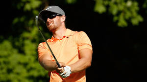 Professional Golfer Patrick Rodgers Swinging His Club Wallpaper