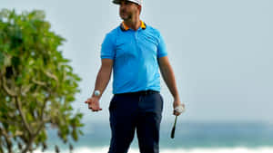 Professional Golfer Scott Piercy In Action Wallpaper