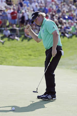 Professional Golfer William Mcgirt Focused On His Shot Wallpaper