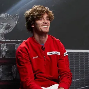 Professional Tennis Player - Andrey Rublev Looking Focused In A Sweatshirt Wallpaper