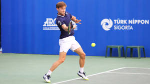 Professional Tennis Player David Goffin In Action On The Court Wallpaper