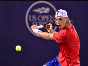 Professional Tennis Player Denis Shapovalov In Action Wallpaper