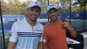 Prolific Tennis Duos, Bob Bryan And Mike Bryan, Smiling In Triumph Wallpaper